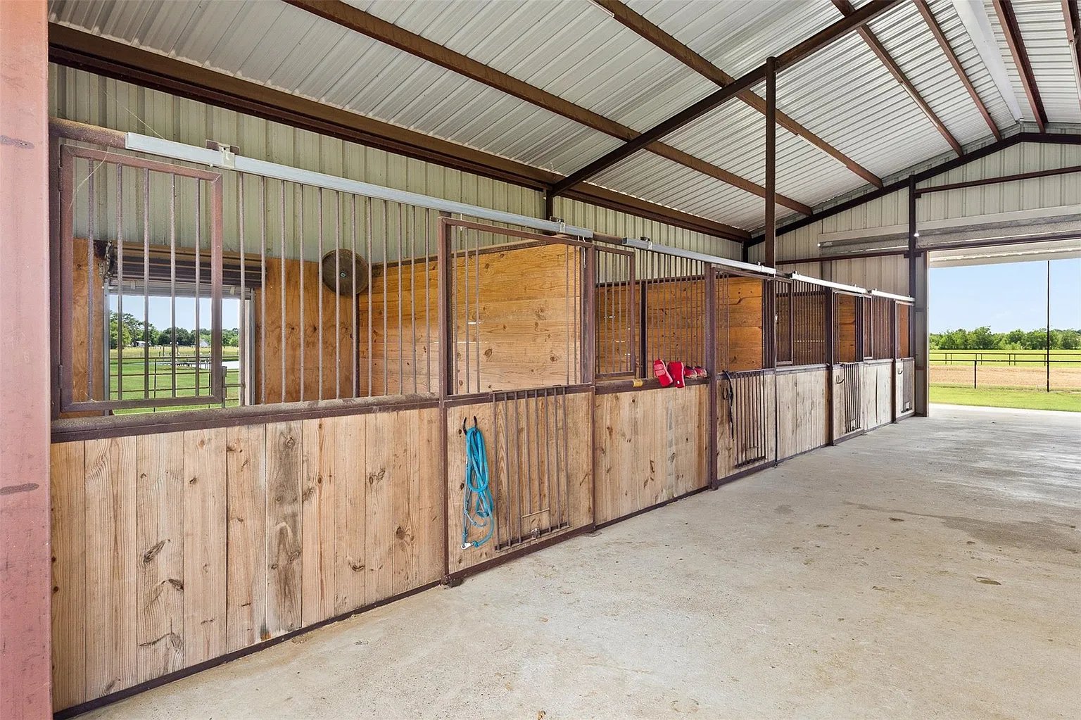 20.35 Acres, Custom 4/3 Barndominium, 6-Stall Stable, Lighted Arena, Turnout Pens, Hay Pasture, Multiple Barns, Workshop, Fenced/ Cross Fenced